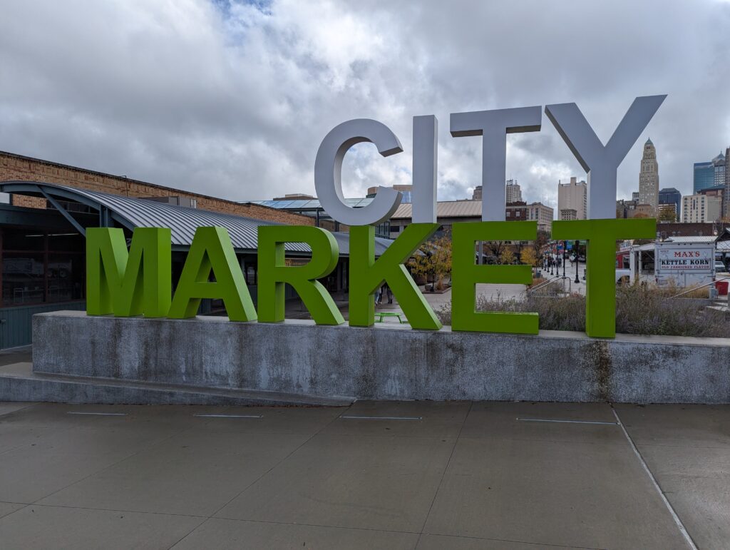 Entrance sign at Kansas City’s City Market, a historic marketplace with a vibrant community atmosphere.