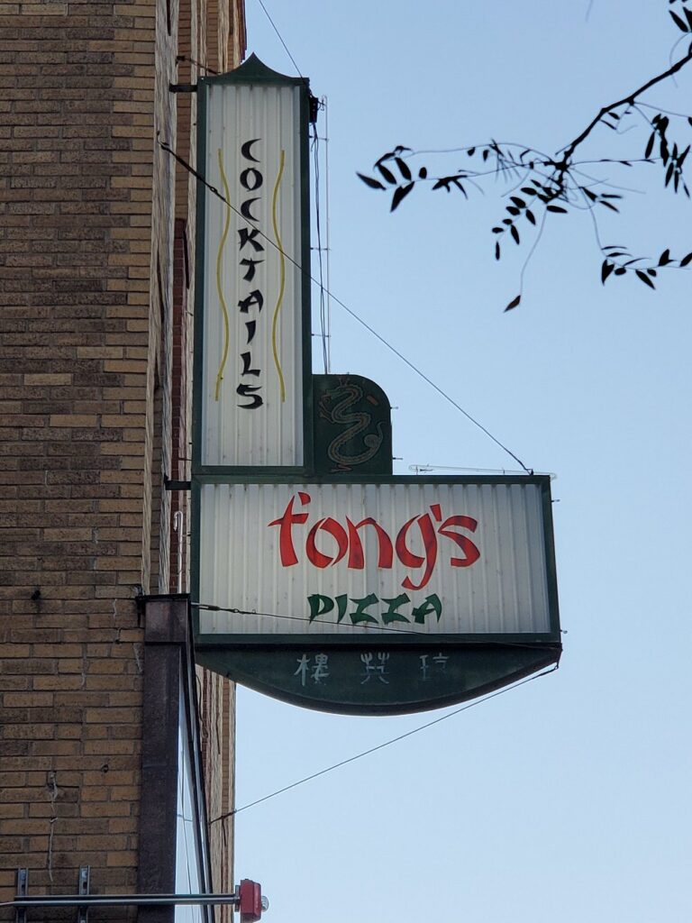 Fong's Pizza sign, a must-visit spot for a weekend in Des Moines known for its unique Asian-inspired pizzas and fun atmosphere.